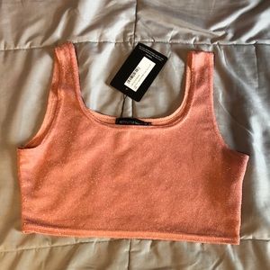 Pink crop top with silver sparkling on it!